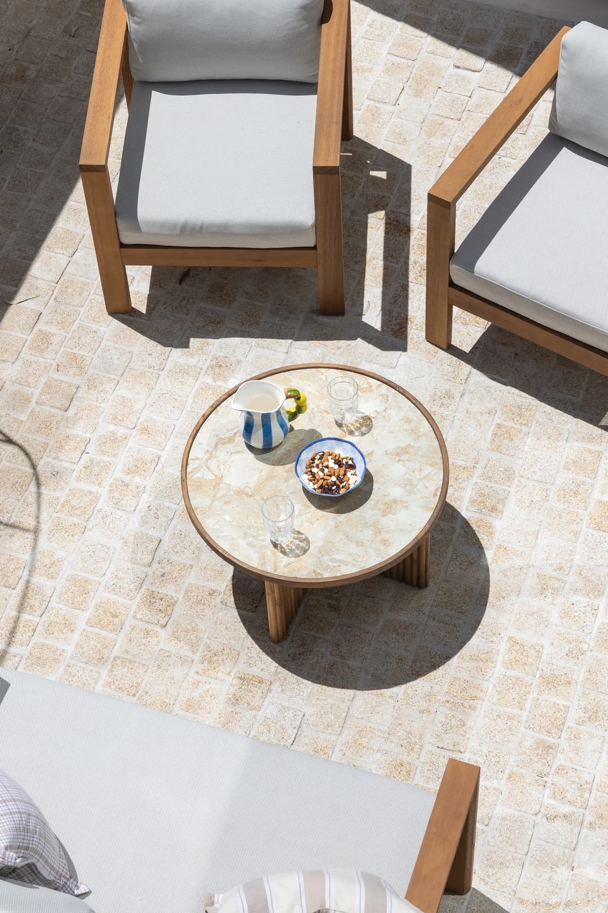 Courtyard seating and travertine paving